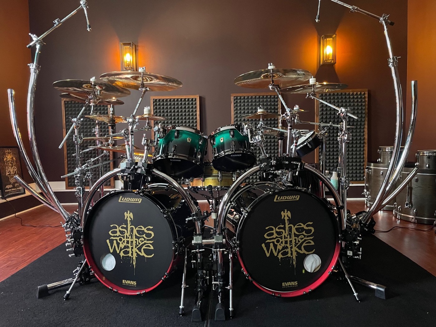 A Ludwig double bass kit painted for Lamb of God, green fade shells and Ashes of the Wake heads